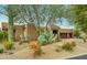 Landscaped front yard with drought-tolerant plants at 11890 N 118Th St, Scottsdale, AZ 85259