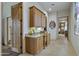 Hallway with built-in desk and granite countertop at 11890 N 118Th St, Scottsdale, AZ 85259