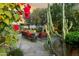 Landscaped patio with seating area and desert plants at 11890 N 118Th St, Scottsdale, AZ 85259