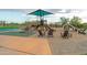 Community playground with shaded seating at 11890 N 118Th St, Scottsdale, AZ 85259