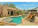 Stunning pool and spa with flagstone patio and comfortable lounge chairs at 11890 N 118Th St, Scottsdale, AZ 85259