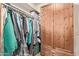 Double door closet with hanging rods and shelving at 12450 W Fieldstone Dr, Sun City West, AZ 85375