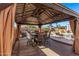 Covered patio with dining area, great for outdoor entertaining at 12450 W Fieldstone Dr, Sun City West, AZ 85375