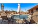 Relaxing backyard oasis with a sparkling pool and patio furniture at 12450 W Fieldstone Dr, Sun City West, AZ 85375