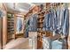 Spacious walk-in closet with shelving and hanging space at 12450 W Fieldstone Dr, Sun City West, AZ 85375