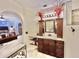 Main bathroom with double vanity and access to bedroom at 13602 S Garnet Rd, Buckeye, AZ 85326