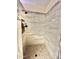 Walk in shower with tiled walls and floor at 13602 S Garnet Rd, Buckeye, AZ 85326