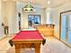 Game room with pool table and wet bar at 13602 S Garnet Rd, Buckeye, AZ 85326