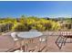 Scenic rooftop deck with seating area and mountain views at 13602 S Garnet Rd, Buckeye, AZ 85326