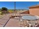 Enjoy scenic mountain views from this rooftop deck, complete with table and chairs at 13602 S Garnet Rd, Buckeye, AZ 85326