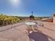 Spacious rooftop deck with panoramic views and seating area at 13602 S Garnet Rd, Buckeye, AZ 85326