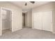 Large bedroom with ensuite bathroom and walk-in closet at 13608 N 150Th Ln, Surprise, AZ 85379