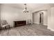 Open dining area with wood-look tile floor and shiplap wall at 13608 N 150Th Ln, Surprise, AZ 85379