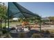 Community playground with shade structure at 13608 N 150Th Ln, Surprise, AZ 85379