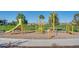 Modern playground with various play equipment at 13608 N 150Th Ln, Surprise, AZ 85379