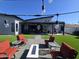 Modern backyard with patio, artificial turf and string lights at 14426 N 39Th Way, Phoenix, AZ 85032