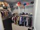 Large walk-in closet with ample shelving and hanging space at 14426 N 39Th Way, Phoenix, AZ 85032