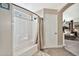 Main bathroom with a bathtub, shower, and linen closet at 15791 W Mohave St, Goodyear, AZ 85338