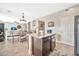 Kitchen island with granite countertops and modern appliances at 15791 W Mohave St, Goodyear, AZ 85338