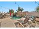 Relaxing pool area with patio seating and fire pit at 15791 W Mohave St, Goodyear, AZ 85338