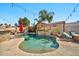 Stunning pool with patio furniture and string lights at 15791 W Mohave St, Goodyear, AZ 85338