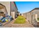 Landscaped side yard with grassy area and storage at 15791 W Mohave St, Goodyear, AZ 85338