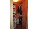 Walk-in cedar closet with ample shelving and hanging space at 16809 N Meadow Park Dr, Sun City, AZ 85351