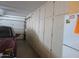 Garage with ample storage cabinets and space for one car at 16809 N Meadow Park Dr, Sun City, AZ 85351