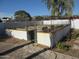 Enclosed garden area with raised beds and a chain link fence at 16809 N Meadow Park Dr, Sun City, AZ 85351