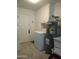 Laundry room with washer, dryer and water heater at 16809 N Meadow Park Dr, Sun City, AZ 85351