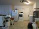 Laundry room with washer, dryer, storage cabinets and sink at 16809 N Meadow Park Dr, Sun City, AZ 85351