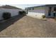 Gravel side yard with walkway to home at 16809 N Meadow Park Dr, Sun City, AZ 85351