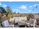 Cozy back patio, perfect for enjoying Arizona's beautiful desert scenery with string lights at 17318 E Quail Ridge Dr, Fountain Hills, AZ 85268