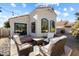 Charming backyard patio with comfortable seating and lovely views of home's architecture at 17318 E Quail Ridge Dr, Fountain Hills, AZ 85268