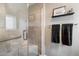 Bathroom featuring glass enclosed shower, grab bar and dark towel set at 17318 E Quail Ridge Dr, Fountain Hills, AZ 85268