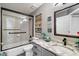 Modern bathroom with a tub and shower combo and a single sink vanity with granite countertop at 17318 E Quail Ridge Dr, Fountain Hills, AZ 85268