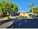 Single-story home with landscaped yard and two-car garage at 17790 N 66Th Ln, Glendale, AZ 85308