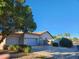 Two-car garage, lush landscaping and driveway at 17790 N 66Th Ln, Glendale, AZ 85308