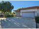 Two-car garage with ample driveway space at 17790 N 66Th Ln, Glendale, AZ 85308