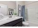 Clean bathroom with single vanity and shower/tub combo at 18173 W Cielo Grande Ave, Surprise, AZ 85387