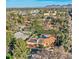 Aerial view of a home showcasing solar panels, pool, and surrounding landscape at 2 W Keim Dr, Phoenix, AZ 85013