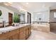 Spa-like bathroom with soaking tub, double sinks, and glass block window at 2 W Keim Dr, Phoenix, AZ 85013