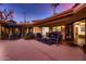 Charming courtyard with seating area and access to interior at 2 W Keim Dr, Phoenix, AZ 85013