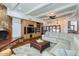 Living room features a fireplace, built-ins, and terracotta flooring at 2 W Keim Dr, Phoenix, AZ 85013