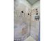 Large walk-in shower with tile surround at 20040 W Hunter Dr, Wittmann, AZ 85361