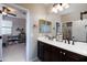 Double vanity bathroom with modern fixtures at 20473 W Park Meadows Dr, Buckeye, AZ 85396