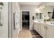 Double vanity bathroom with walk-in shower and large closet at 21720 N 265Th Dr, Buckeye, AZ 85396