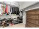 Large walk-in closet with ample shelving and dresser at 21720 N 265Th Dr, Buckeye, AZ 85396