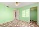 Light green bedroom with window and closet at 22352 W Meade Ln, Buckeye, AZ 85326