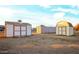 Various storage sheds and containers in the backyard at 22352 W Meade Ln, Buckeye, AZ 85326